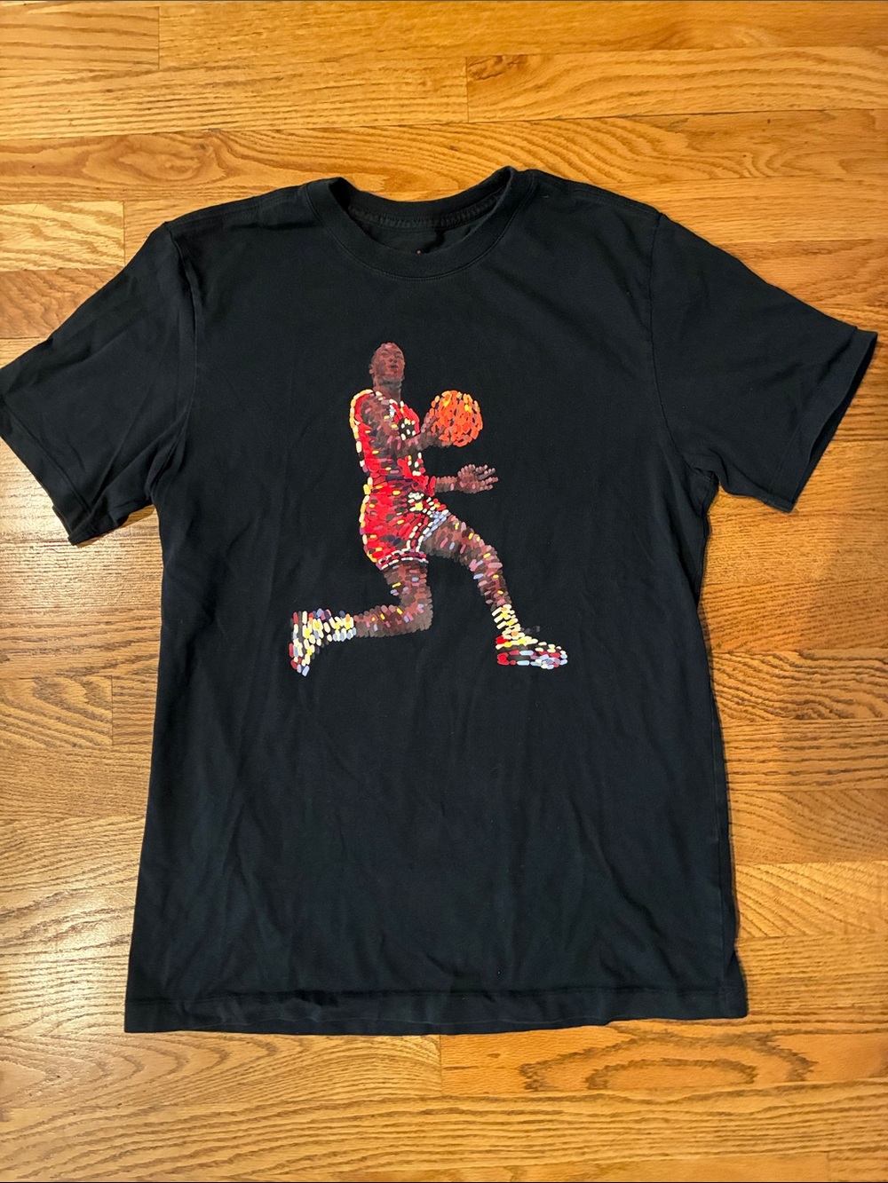 Jordan Black Short-Sleeve Tee with Red Basketball Player Graphic